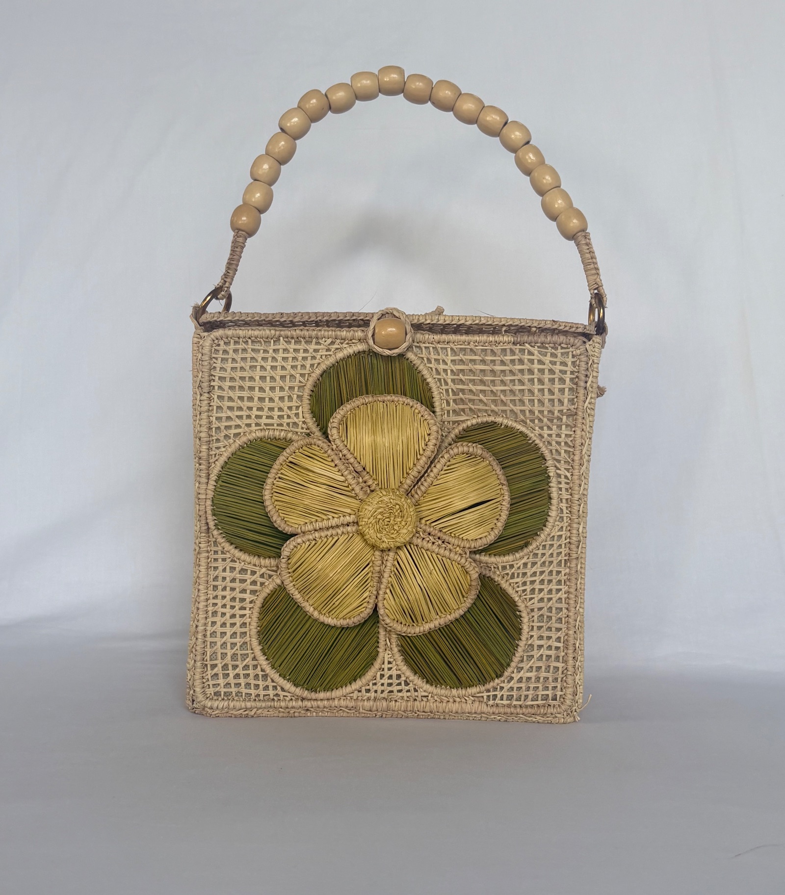 Bolsos cofre flor relieve